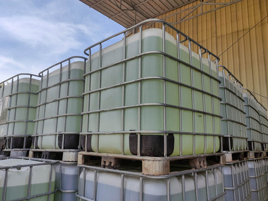 IBC Tanks Stacked On Top of Each other under covering